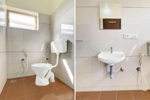 a bathroom with a toilet and a sink at Super Collection O Chikmangaluru Near Railway Station in Chikmagalūr