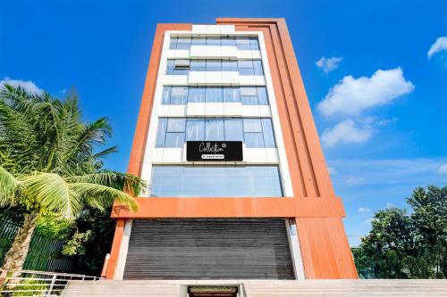 a tall building with a sign on it at Super Collection O BN Reddy Hyderabad in Hyderabad