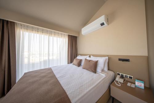 Prive Side Suite & Spa hotelにあるベッド