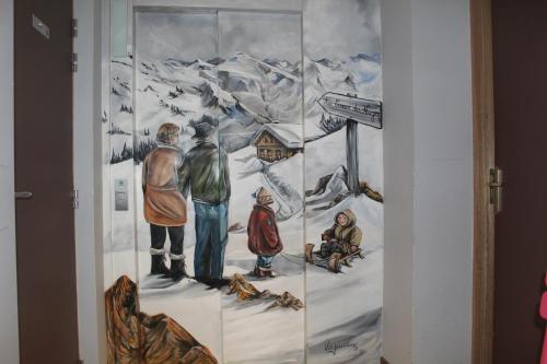 a painting of a group of people on a snow covered mountain at Le Schuss in Châtel