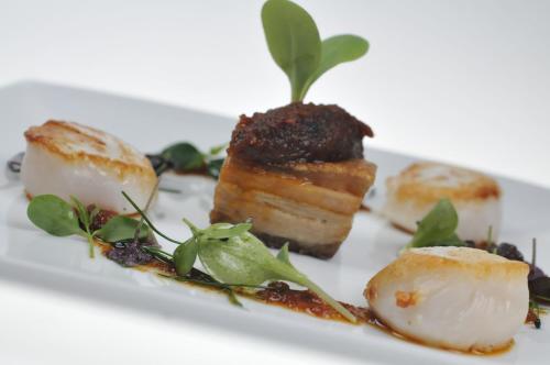a plate with some food on a white plate at Hopping Hare in Northampton
