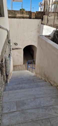 an entrance to a tunnel in a building at civico 44 in Bova Marina