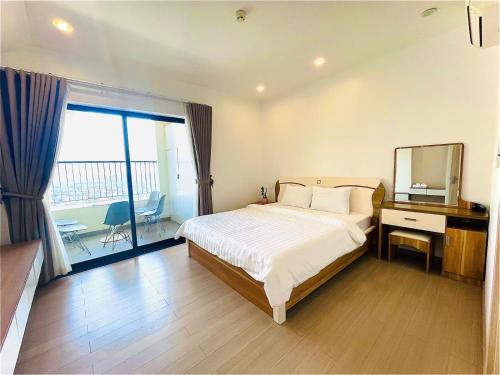 Postel nebo postele na pokoji v ubytování Lucy Apartment Huế