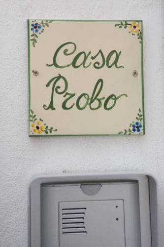 a sign that says casa radio above a computer monitor at B&B Casa Probo in Tricase