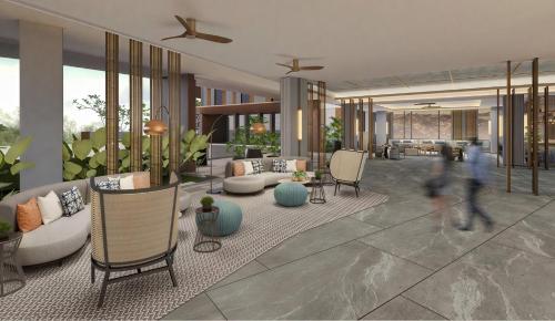 a rendering of a living room with furniture at Crowne Plaza Labuan Bajo by IHG in Labuan Bajo