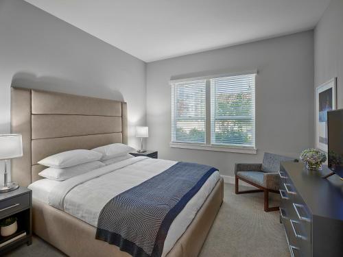 Voodi või voodid majutusasutuse AVE Blue Bell - Short Stay Furnished Apartment toas