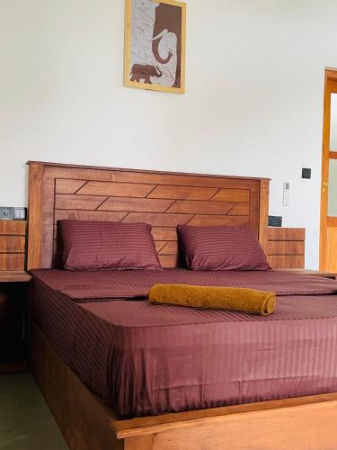 Postel nebo postele na pokoji v ubytování Leema hiriketiya