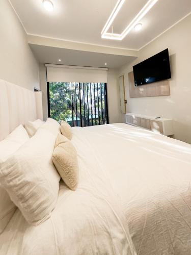 Alma Residenceにあるベッド