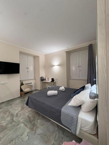 Ένα ή περισσότερα κρεβάτια σε δωμάτιο στο That's Amore Accommodation Tropea