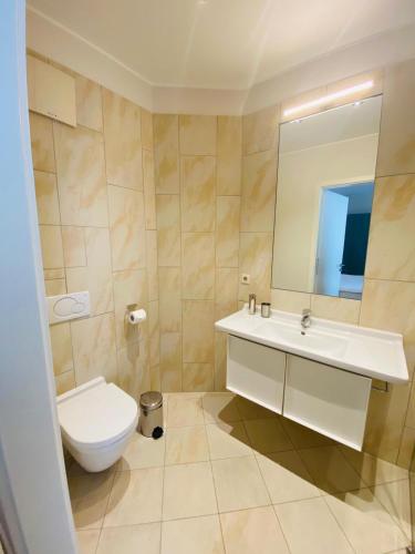 Un baño de Key Inn Appart Hotel Belair