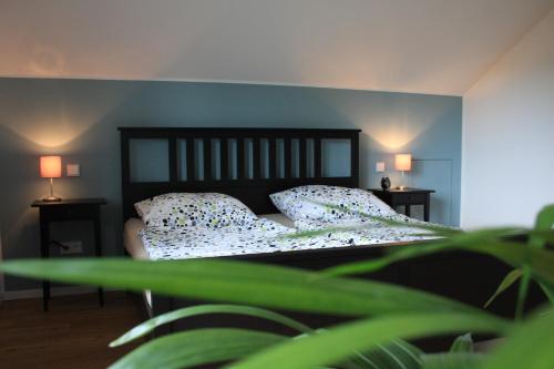 Säng eller sängar i ett rum på Premium Ferienloft Dreßler Fulda