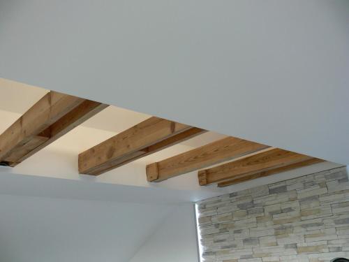 a room with wooden beams on the ceiling at Premium Ferienloft Dreßler Fulda in Fulda