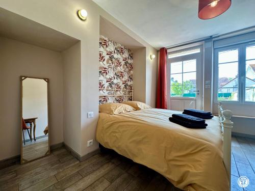 Giường trong phòng chung tại La maison de Marguerite - 5 personnes