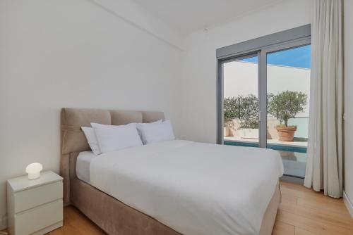 Кровать или кровати в номере Villa Roc Blanc