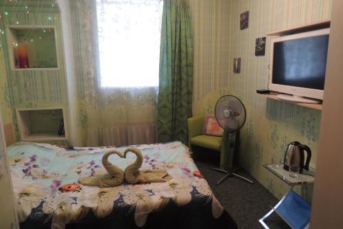 Кровать или кровати в номере Фрегат на Павелецкой