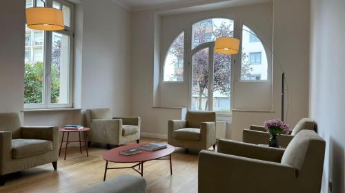 Un lugar para sentarse en Key Inn Appart Hotel Belair