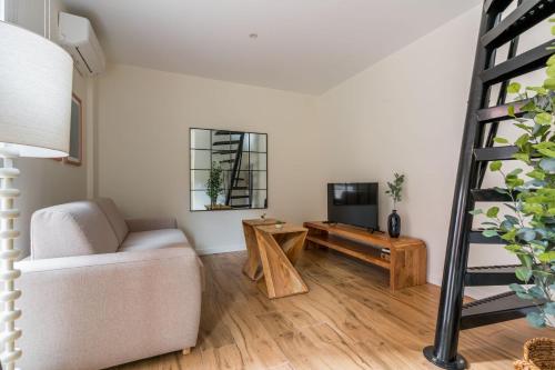 TV a/nebo společenská místnost v ubytování Cozy apartment- 1Bd 1Bth- Plaza Castilla