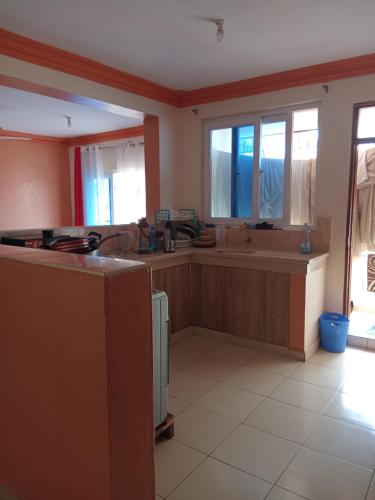 a kitchen with a sink and a counter top at Mtwapa Luxurious Residence with Pool Block 1 in Mombasa