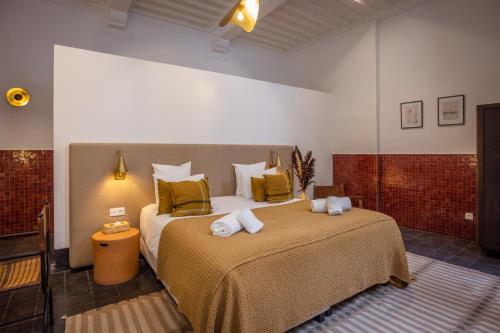 Cama o camas de una habitación en Riad Dar Nakous