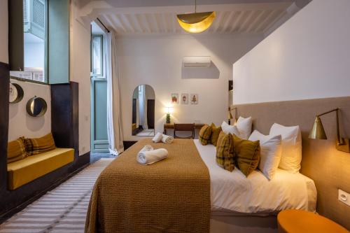 Cama o camas de una habitación en Riad Dar Nakous