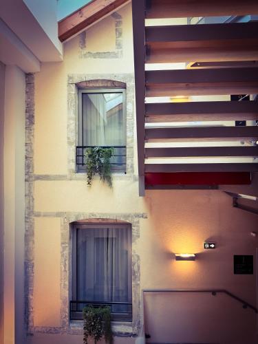 Μπαλκόνι ή βεράντα στο Churchill Hotel Bayeux Centre