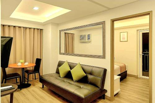 Χώρος καθιστικού στο JMM Grand Suites