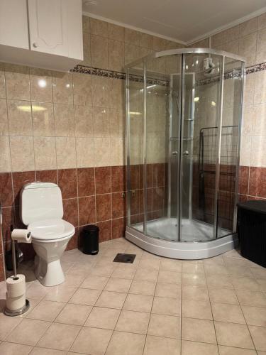 Koupelna v ubytování Treroms leilighet på Lunheim