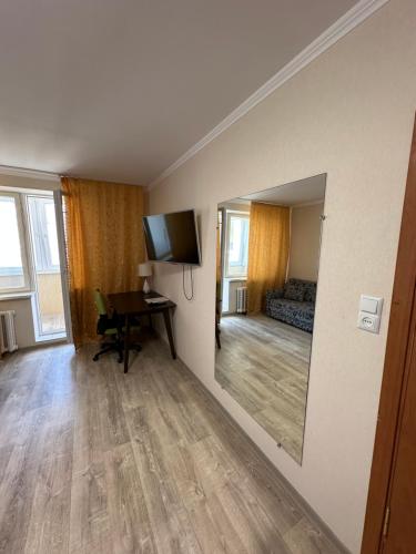 TV a/nebo společenská místnost v ubytování Bright and Comfortable Central Flat