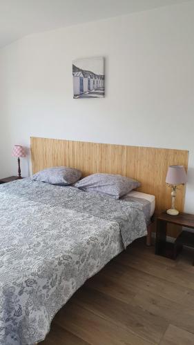 Postel nebo postele na pokoji v ubytování Ty Roise