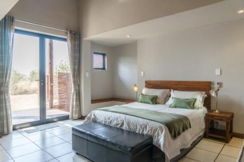 Ένα ή περισσότερα κρεβάτια σε δωμάτιο στο Zebula Bush Villa 82, Zebula Golf Estate and Spa