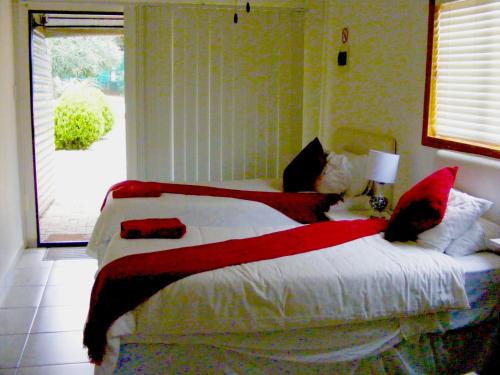 Katil atau katil-katil dalam bilik di Donum Ex Deo Self catering units