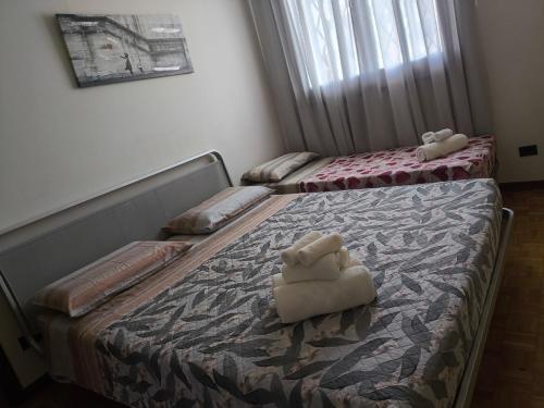 Ένα ή περισσότερα κρεβάτια σε δωμάτιο στο B&B dei nonni