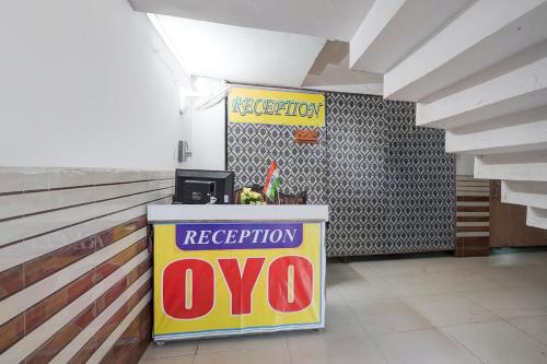 a sign for a repository at HOTEL O SP GRAND Sidhauli in Mahmūdābād