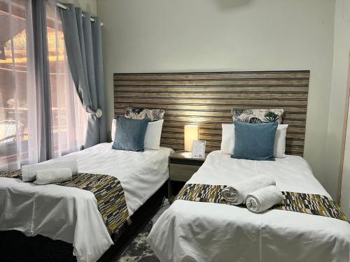 Map's View Guesthouseにあるベッド