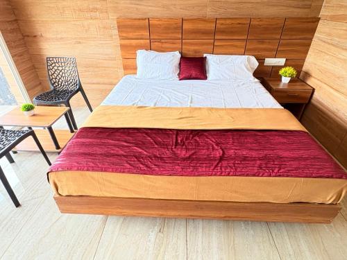 Ένα ή περισσότερα κρεβάτια σε δωμάτιο στο Cozy meadows homestays