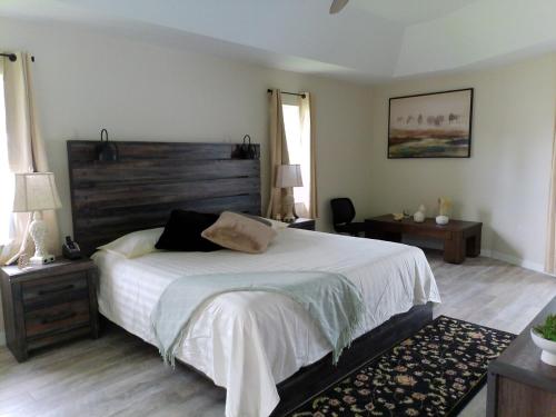 Voodi või voodid majutusasutuse Villa Varona your private oasis toas