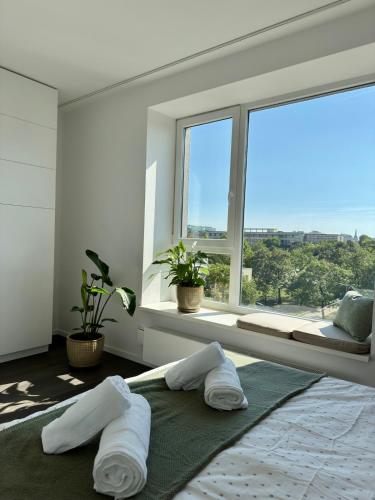 Katil atau katil-katil dalam bilik di Cozy Apartment with Castle view
