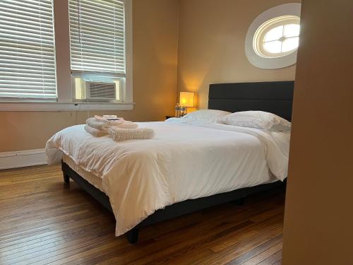 Ένα ή περισσότερα κρεβάτια σε δωμάτιο στο Stay with Jay - Quinta Suite