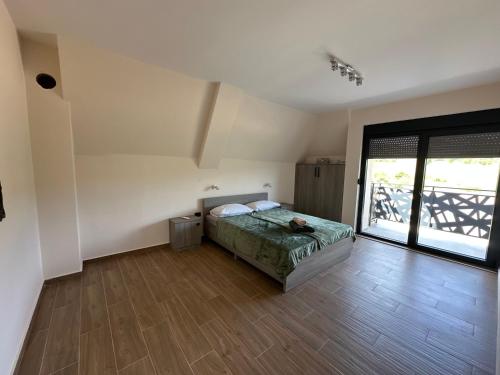 Una cama o camas en una habitación de Vila Remeta