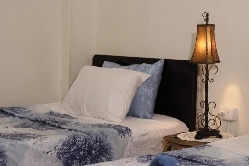Postel nebo postele na pokoji v ubytování Abeer Guest House
