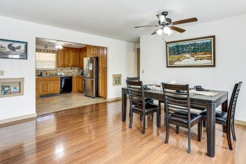 a kitchen and dining room with a table and chairs at Relaxing Outdoor Spaces Quiet Wooded Gem in Hardy in Hardy