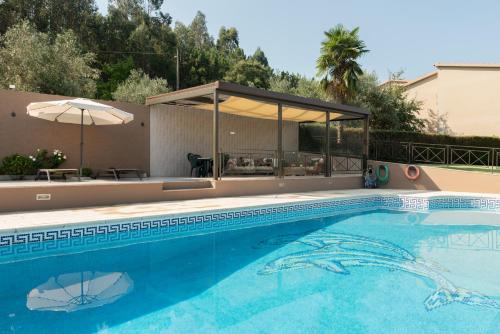 Πισίνα στο ή κοντά στο Retiro na Aldeia