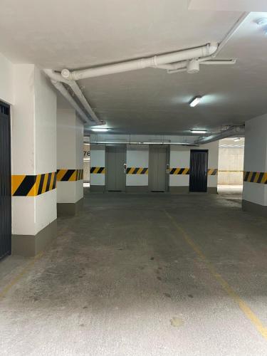 an empty parking lot in a parking garage at Confortable and modern, 14th Floor in La Paz