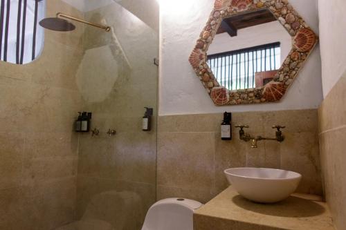 Ένα μπάνιο στο Aura Hotel Barú