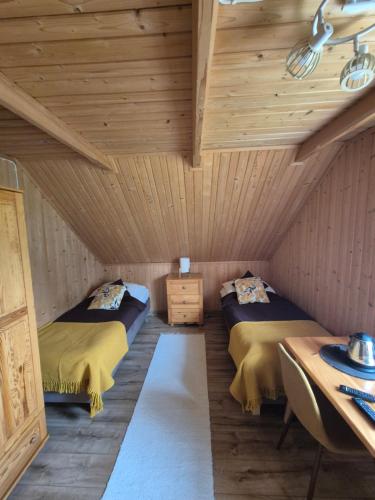 U Parów Sauna & Jacuzziにあるベッド