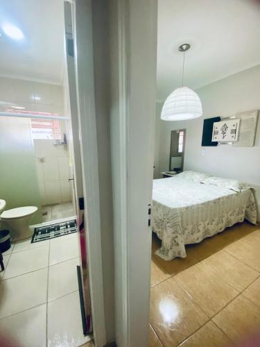 Casa com Aconchego e Acolhimento de Antigamenteにあるベッド