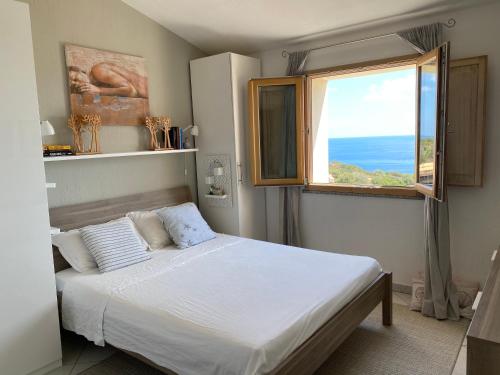 Ένα ή περισσότερα κρεβάτια σε δωμάτιο στο The refuge on the sea...