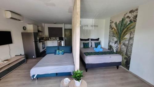 Postel nebo postele na pokoji v ubytování BORA BORA - Blue Pearl Studio