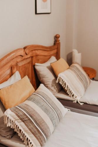 two beds with pillows on them in a bedroom at Uroczysko Oleśnica in Chodzież