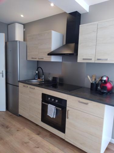 Η κουζίνα ή μικρή κουζίνα στο Vkls Appartement 1